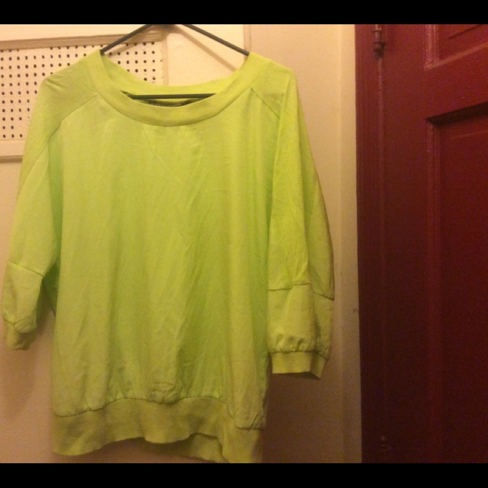 Light green top. Elephant sleeve. Boarder neck.